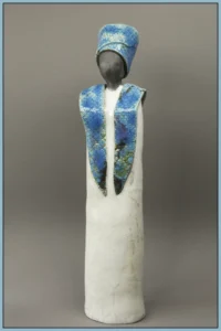 Beeld met blauwe klederdracht